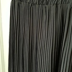 Pleated black midi skirt